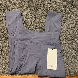 Lululemon purple tight with Tag